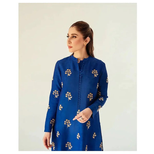 2-piece silk dress features intricate hand-embroidery